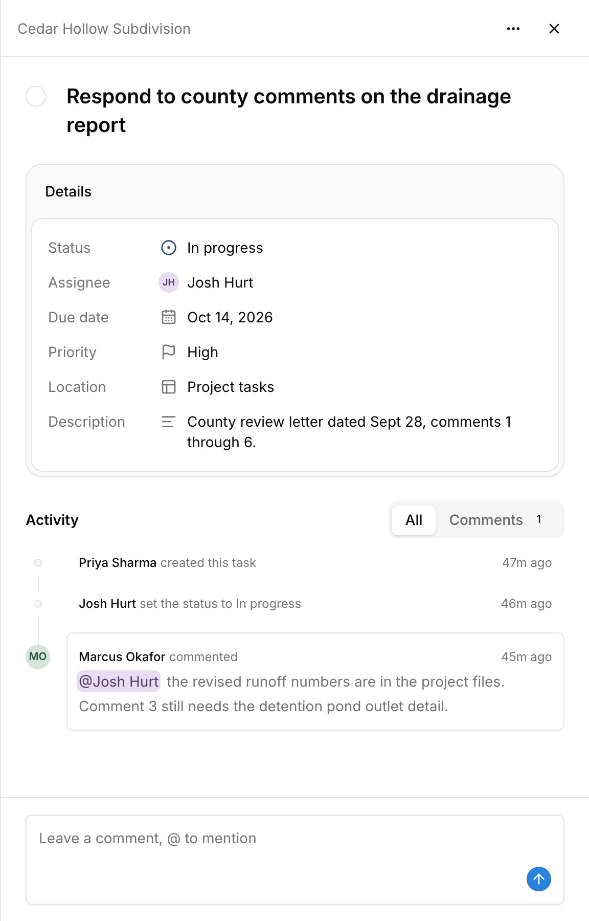 A task in Paradesk with its status, assignee, due date, priority, location, and description, and a comment that mentions a teammate